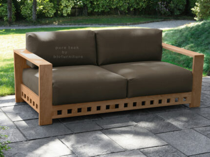 two seater sofa in dark shed