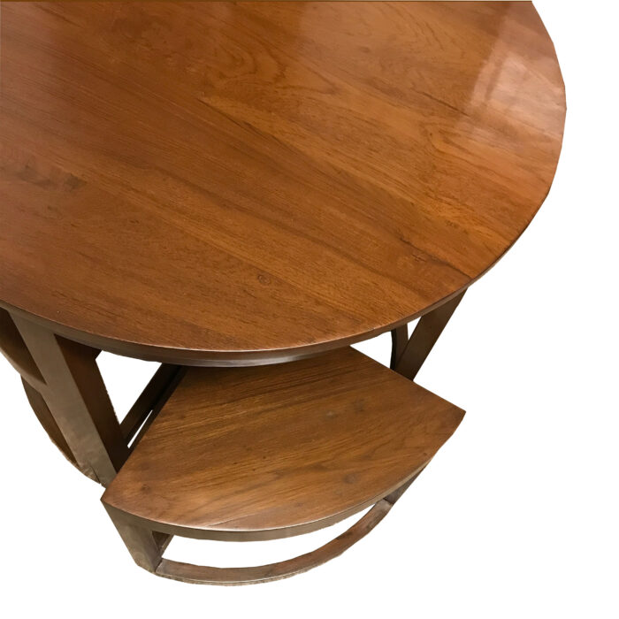 round dining table of teakwood