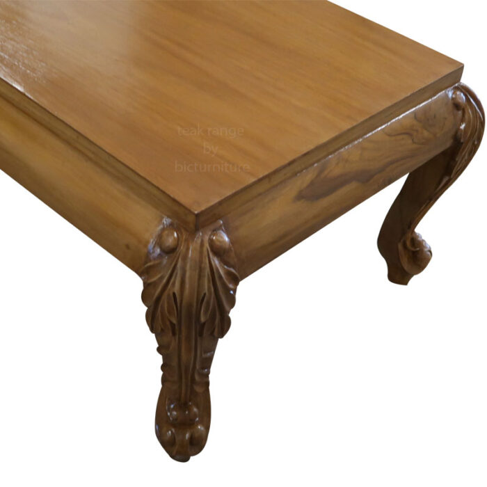 Teakwood carved coffee table with veneer top 1